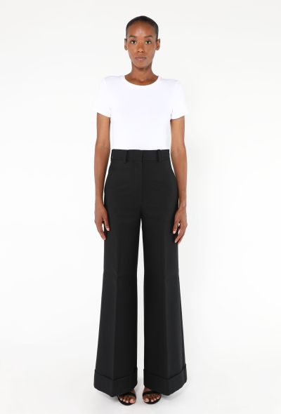 Khaite Wide-Leg Cuffed Trousers - 1