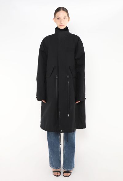 Sacai 2021 x KAWS Mackintosh Parka - 1
